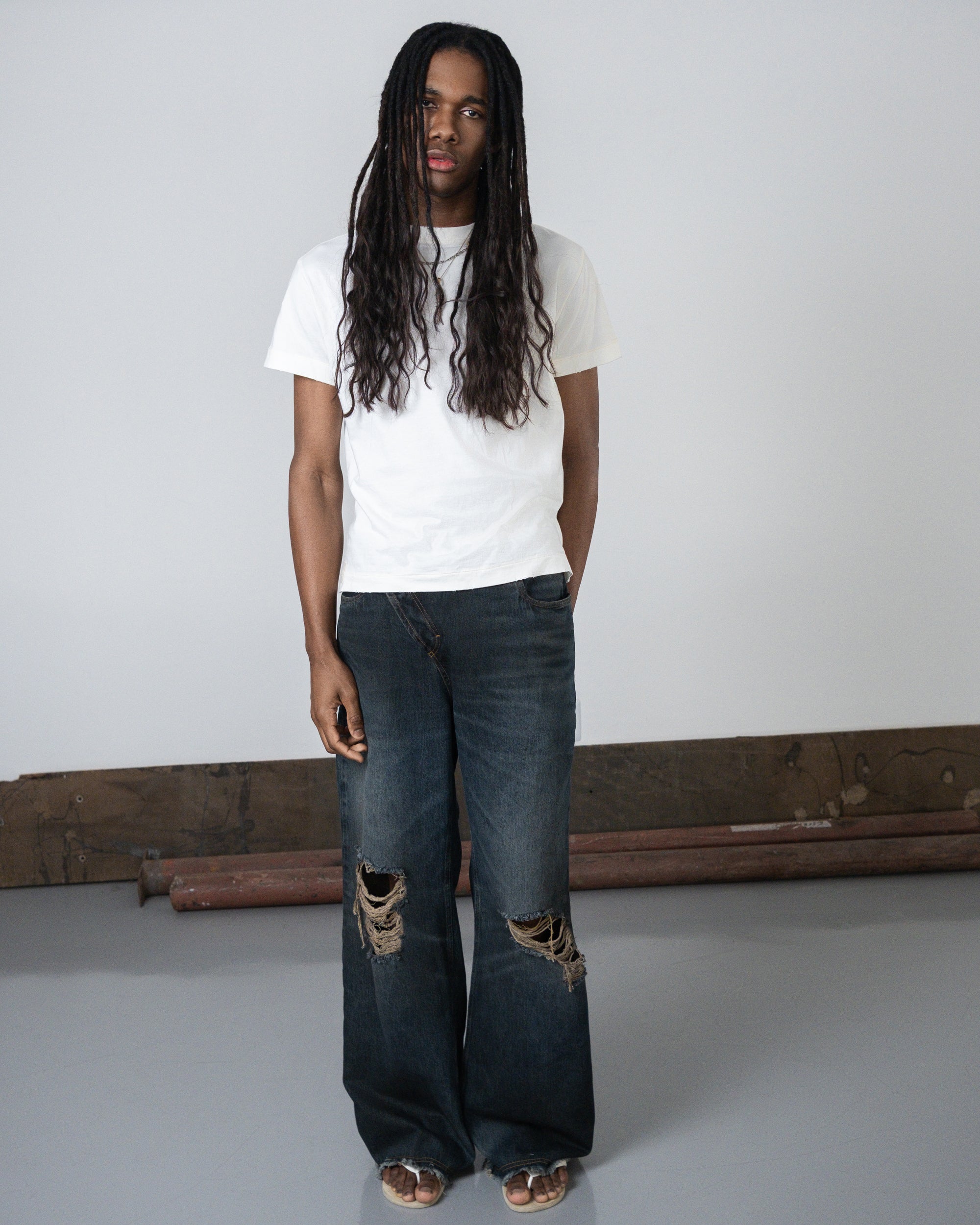 Blue 'UNF' Asymmetrical Denim Pants
