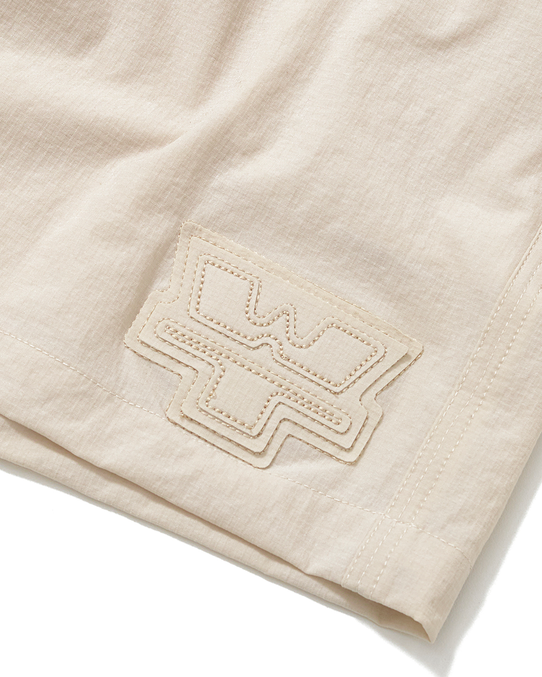 Beige Embroidered Ripstop Shorts